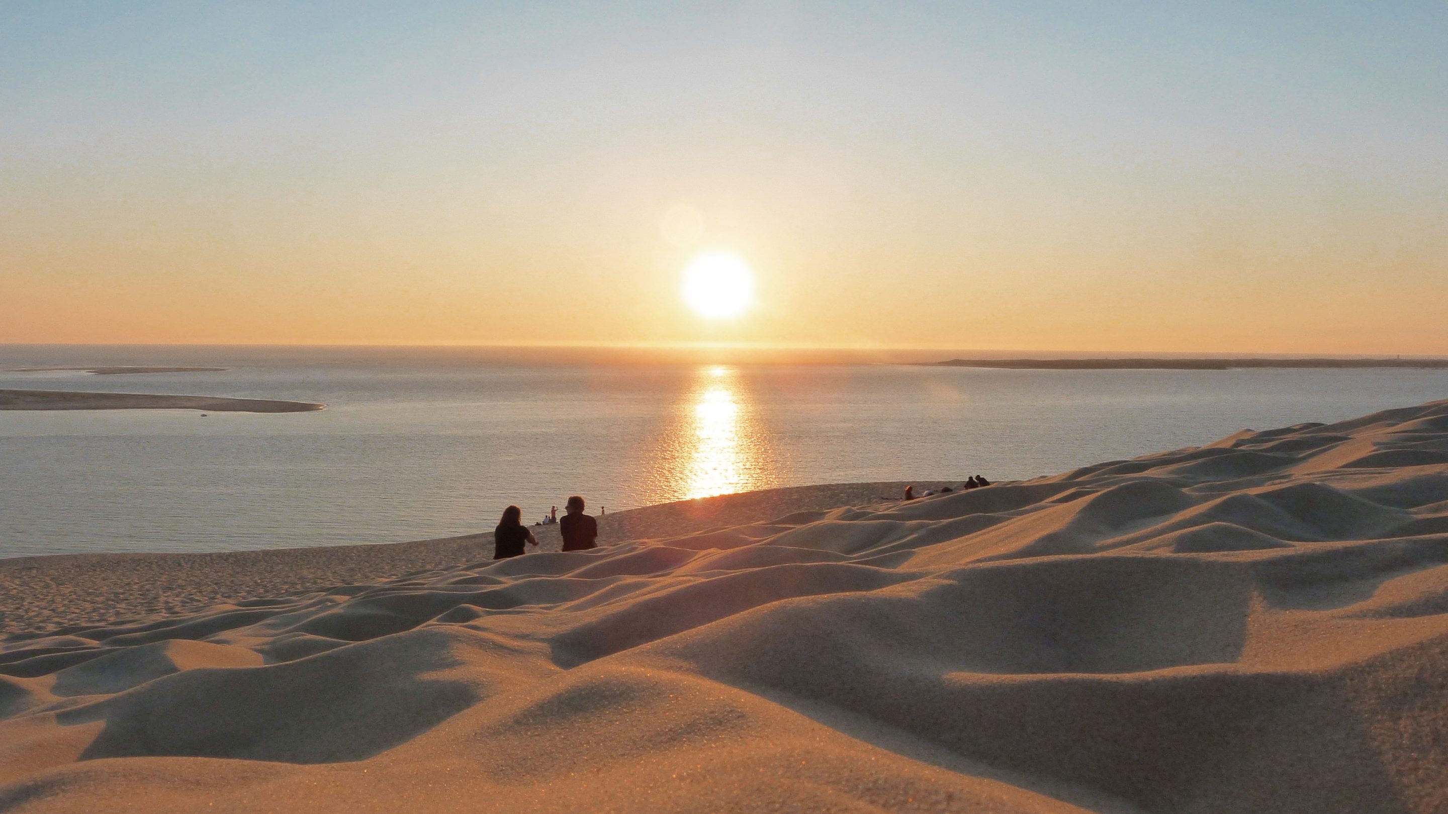 Een zonsondergang op de Dune du Pilat is een onvergetelijke ervaring 